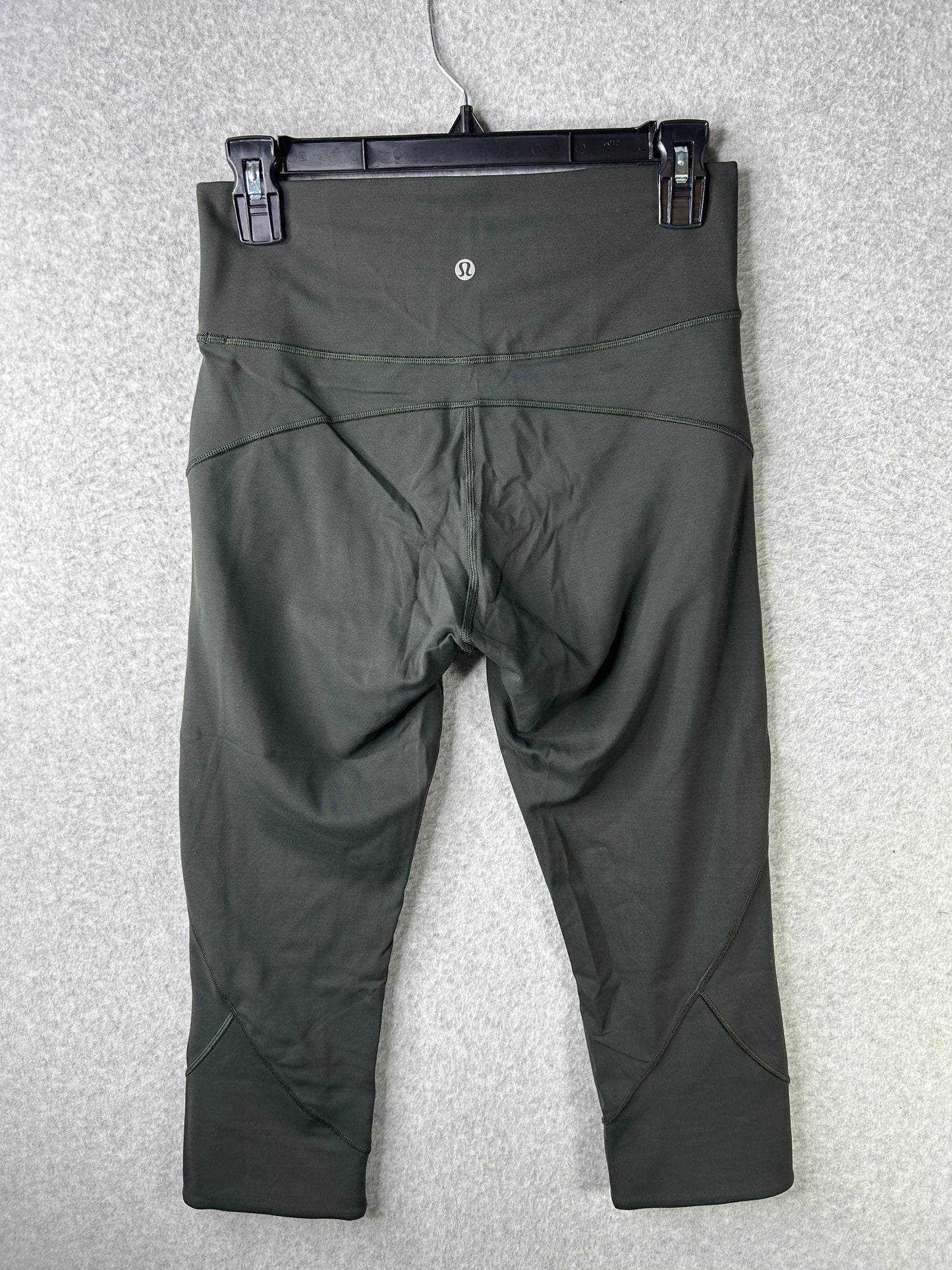 Lululemon In Movement Crop Everlux 20" Size 8 Evergreen