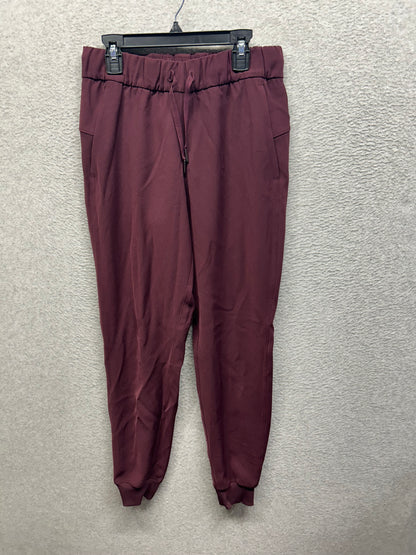 Lululemon On the Fly Jogger Woven Size 4 Cassis