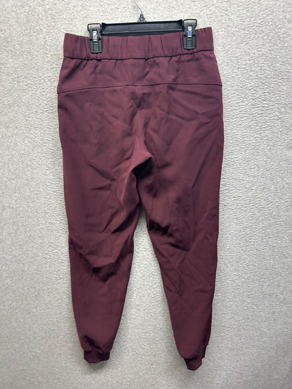 Lululemon On the Fly Jogger Woven Size 4 Cassis