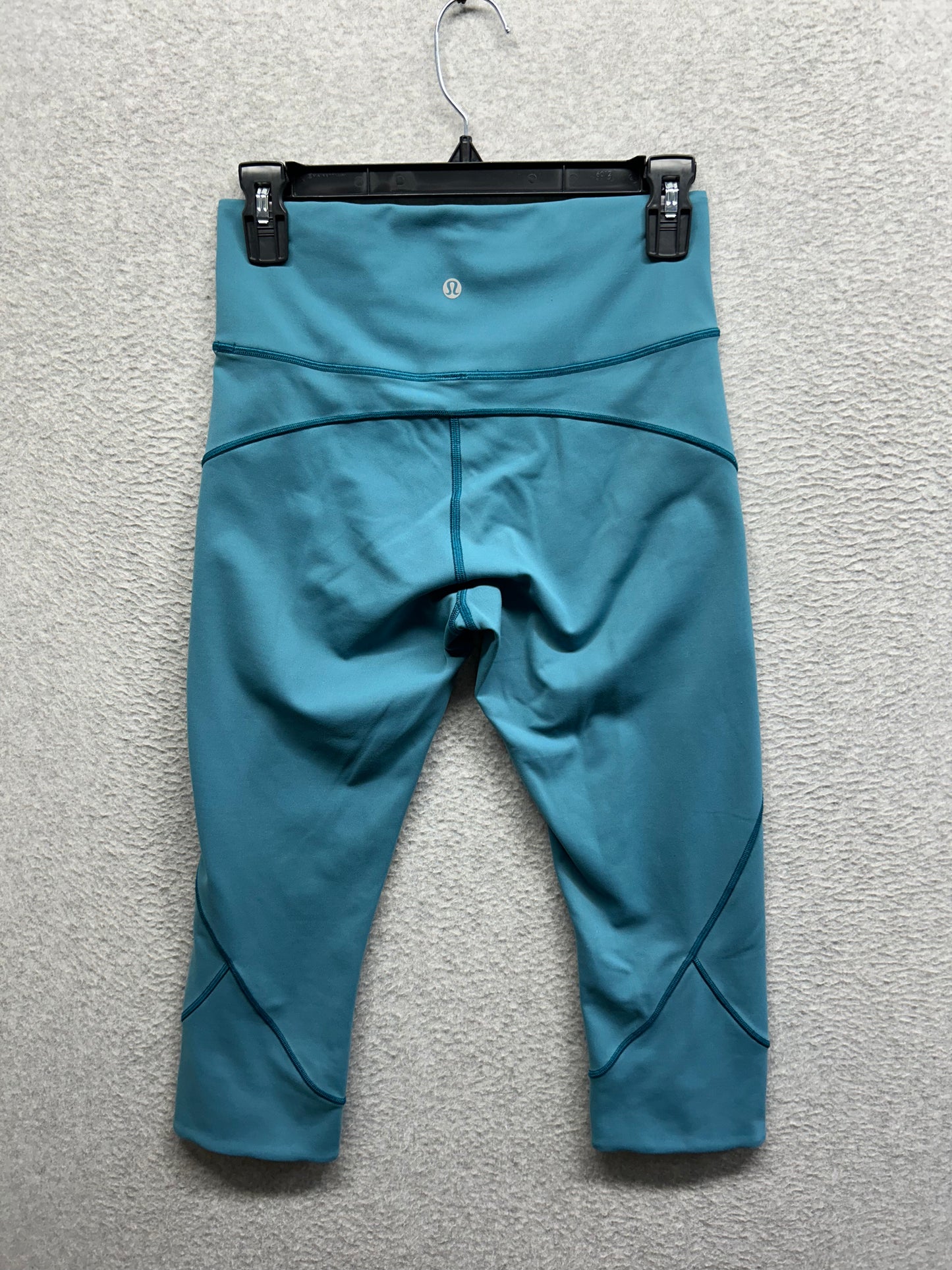 Lululemon In Movement Crop Everlux 19" Size 8 Pacific Teal