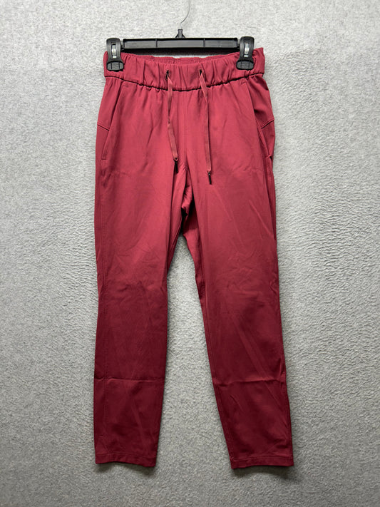 Lululemon On the Fly 7/8 Pant Size 2 Chianti