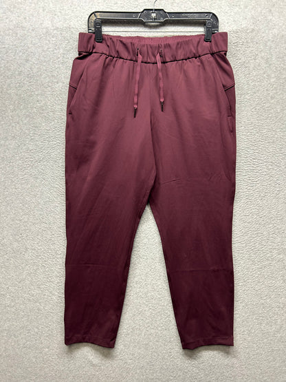 Lululemon On the Fly 7/8 Pant Size 10 Dark Adobe