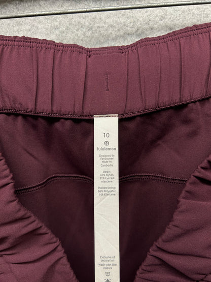 Lululemon On the Fly 7/8 Pant Size 10 Dark Adobe