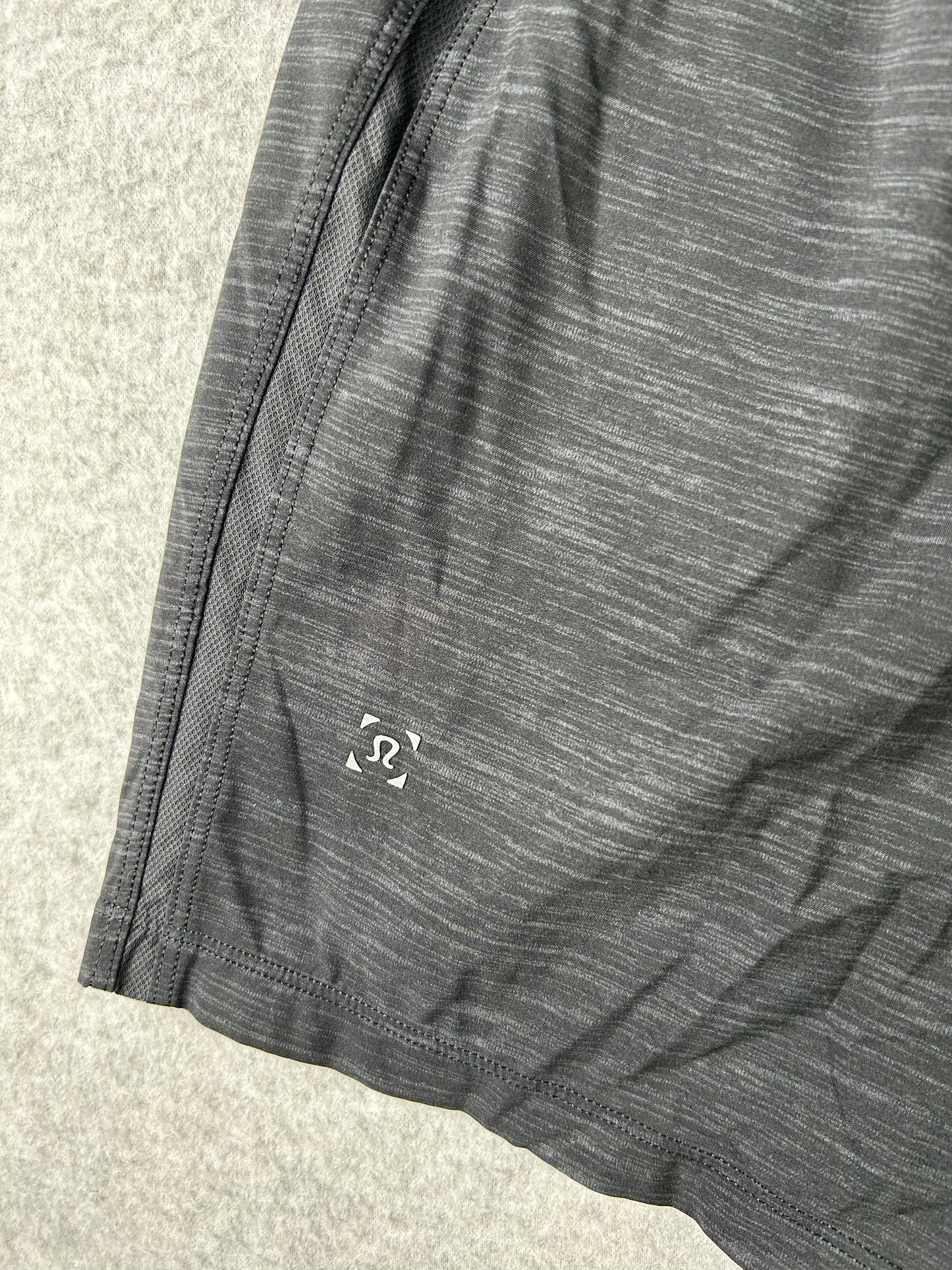 Lululemon Pace Breaker Short Linerless 7" Size Medium Heather Allover Deep Coal Black
